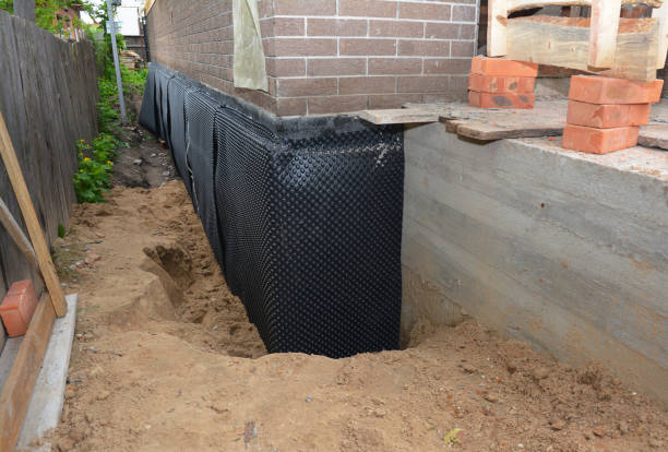SJ Waterproofing Pros technician performing targeted Emergency Waterproofing assessment in Princeton, WI